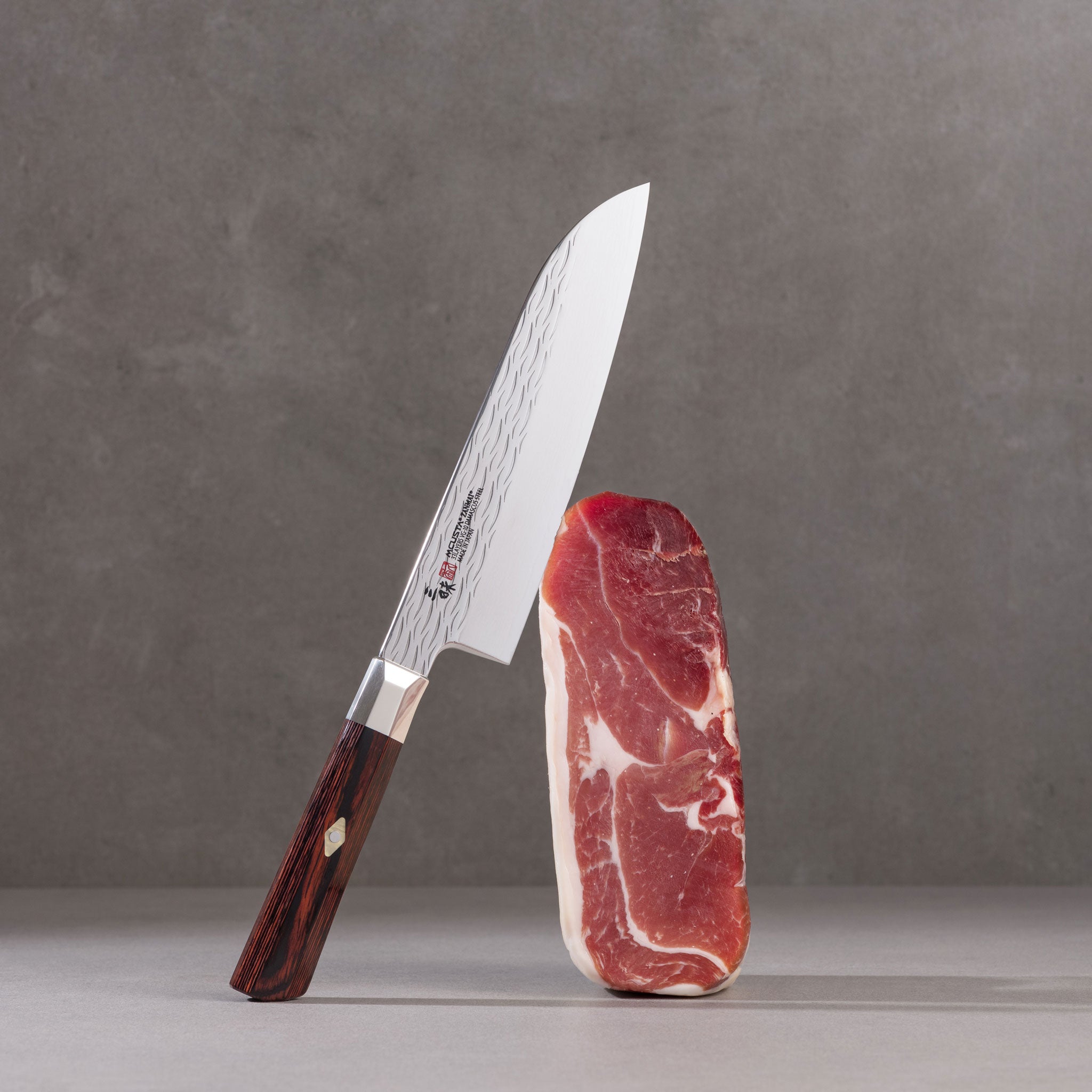Mcusta Zanmai Supreme Ripple Santokukniv 18 cm